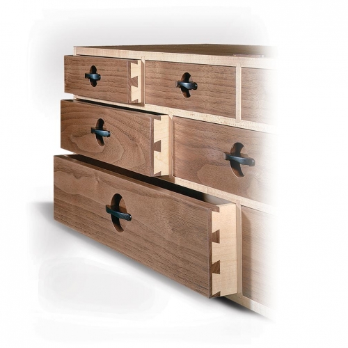 Closeup of Drawer Case from Cabinetmaker's Chest in maple, pulls in African black wood, with half-blind dovetails on drawers, and sliding dovetails on carcass. 9H x 31W x 8D