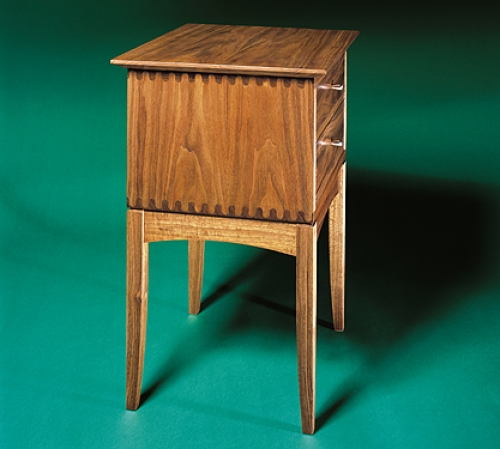 End Table in walnut with square and rounded finger joints. 26H x 18W x 16D
