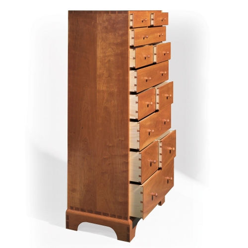 Shaker style chest of drawers in cherry with through and half-blind dovetails on drawers. 51H x 23W x 16D