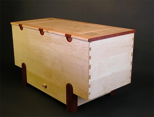 Toy Box in North American and Fiddle Back Maple with accents of Paduak. Half Blind dovetails. Malcolm Harwood.