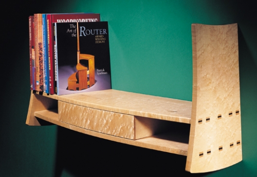 Wall-mounted Bookcase with Drawer in birdseye maple and maple with cocobolo wedges. Featuring square wedged mortise and tenons. 16H x 32 1/4W x 9 1/4D